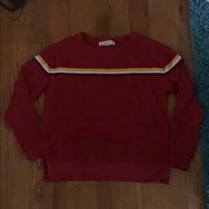 Red sweatshirt with stripes